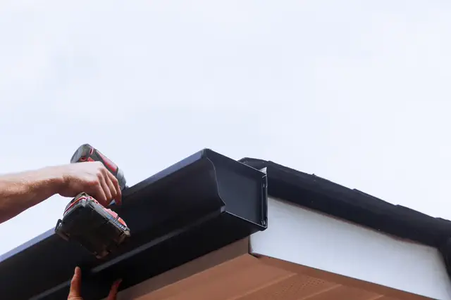 Gutters and downspouts detail on a residential exterior